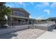 Beautiful backyard featuring a covered patio and fenced pool, creating a perfect outdoor living space at 5145 Porpoise Pl, New Port Richey, FL 34652