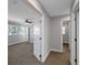 Bedroom view shows a ceiling fan, windows with view, and open entryways at 5145 Porpoise Pl, New Port Richey, FL 34652