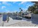 The property includes a private dock with access to deep water, perfect for boating and water sports at 5145 Porpoise Pl, New Port Richey, FL 34652