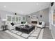 Bright living room features a fireplace, recessed lighting, and stylish decor at 5145 Porpoise Pl, New Port Richey, FL 34652