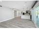 Expansive living area with an open-concept layout, seamlessly connecting to the modern kitchen at 5145 Porpoise Pl, New Port Richey, FL 34652
