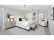 Bedroom with chandelier, stylish furniture, and calm decor at 5145 Porpoise Pl, New Port Richey, FL 34652