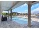 Relax and unwind by the pool, surrounded by a well-maintained deck and overlooking the serene canal at 5145 Porpoise Pl, New Port Richey, FL 34652