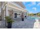 Enjoy seamless indoor-outdoor living with access to the pool and patio area from multiple rooms at 5145 Porpoise Pl, New Port Richey, FL 34652