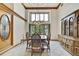 Dining room features large windows, chandelier and plenty of space for entertaining or Gathering gatherings at 5747 Fieldspring Ave, New Port Richey, FL 34655