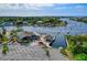 Waterfront restaurant with outdoor seating, boat docks, and ample parking at 6601 Nautical Isle, Hudson, FL 34667