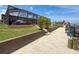 Backyard featuring a screened-in patio, lush lawn, and canal access with private boat dock at 6601 Nautical Isle, Hudson, FL 34667