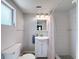 Updated bathroom featuring a vanity and shower with tile surround at 6601 Nautical Isle, Hudson, FL 34667