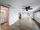 Open floor plan with view of updated bathroom with shower at 6601 Nautical Isle, Hudson, FL 34667