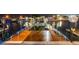 Waterfront dock featuring wood plank floors, decorative touches, and gate access to the open water at 6601 Nautical Isle, Hudson, FL 34667