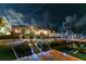 Waterfront property with a screened enclosure, a well-maintained yard, and a private dock for boat access at 6601 Nautical Isle, Hudson, FL 34667