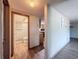 Hallway view of the kitchen and bathroom at 6601 Nautical Isle, Hudson, FL 34667