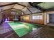 Inviting screened pool with an attached spa and seamless access to the indoors, perfect for entertaining at 6601 Nautical Isle, Hudson, FL 34667
