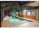 Beautiful screened pool area featuring brick pavers and a relaxing atmosphere for backyard enjoyment at 6601 Nautical Isle, Hudson, FL 34667