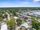 This aerial view showcases a neighborhood near commercial and medical facilities at 6633 Jackson St, New Port Richey, FL 34653