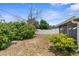 This backyard features plenty of greenery and a privacy fence at 6633 Jackson St, New Port Richey, FL 34653