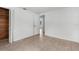 Bedroom featuring tile floors, fresh paint, and a closet with wood slats at 6633 Jackson St, New Port Richey, FL 34653