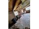 Unfinished room with exposed framing, windows, and a workbench at 7100 Ashwood Dr, Port Richey, FL 34668