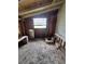 Room with exposed framing and a window at 7100 Ashwood Dr, Port Richey, FL 34668