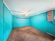 Spacious unfinished basement with concrete block walls and carpet flooring at 7119 Lenape Cir, New Port Richey, FL 34653