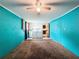 Convenient laundry room with washer, dryer, and easy access to the kitchen at 7119 Lenape Cir, New Port Richey, FL 34653