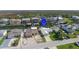 Charming single-story home with an attached garage, lush lawn, and convenient street access at 7313 Hatteras Dr, Hudson, FL 34667