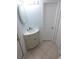 Bathroom features a sleek vanity with elegant fixtures and ample space at 7313 Hatteras Dr, Hudson, FL 34667