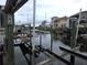 Waterfront property with private boat dock featuring boat lift, perfect for easy access to boating and water activities at 7313 Hatteras Dr, Hudson, FL 34667