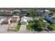 Charming single-story home with an attached garage, lush lawn, and convenient street access at 7313 Hatteras Dr, Hudson, FL 34667