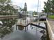 Waterfront homes with boat docks overlooking calm canal waters at 7313 Hatteras Dr, Hudson, FL 34667