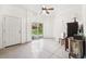 Bonus room featuring an exterior door and sliding glass doors leading to the backyard area at 7340 Brightwaters Ct, New Port Richey, FL 34652