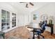 Bright office with decorative tile flooring, lots of natural light, and a modern ceiling fan at 7340 Brightwaters Ct, New Port Richey, FL 34652