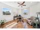 Office with decorative tile flooring, lots of natural light, and a modern ceiling fan at 7340 Brightwaters Ct, New Port Richey, FL 34652