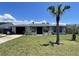 Charming single-story home featuring a well-manicured front yard and inviting curb appeal at 7534 Briarwood Dr, Port Richey, FL 34668