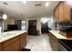 Kitchen provides eat-in bar and overlooks the dining room and backyard entrance at 7534 Briarwood Dr, Port Richey, FL 34668