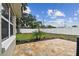 Large fenced backyard features a brick patio and well-maintained landscaping at 7545 Banner St, New Port Richey, FL 34653
