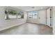 Sunlit bonus room with large windows and tile floors; move in ready! at 7545 Banner St, New Port Richey, FL 34653