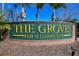 The Groves Golf & Country Club sign welcomes residents and guests to the beautiful community at 8149 Ambersweet Pl, Land O Lakes, FL 34637