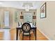 Elegant dining room featuring a modern chandelier and stylish dining set at 8149 Ambersweet Pl, Land O Lakes, FL 34637
