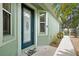 Inviting home entrance with a stylish glass door and side window at 8149 Ambersweet Pl, Land O Lakes, FL 34637