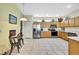 Spacious kitchen featuring stainless steel appliances and lots of light at 8149 Ambersweet Pl, Land O Lakes, FL 34637