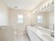 Well-lit bathroom features dual sinks and plenty of counter space at 8248 Sugarbush Dr, Spring Hill, FL 34606