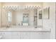 Bathroom showcasing dual sinks, ample counter space, and modern fixtures at 8248 Sugarbush Dr, Spring Hill, FL 34606