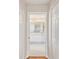En-suite bathroom with dual sinks, white cabinetry, and bright lighting at 8248 Sugarbush Dr, Spring Hill, FL 34606