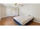 Bedroom with hardwood flooring, closet and ensuite bathroom access at 8248 Sugarbush Dr, Spring Hill, FL 34606