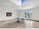 Bright community game room with light wood floors, high ceilings, and a Kettler brand ping pong table at 8248 Sugarbush Dr, Spring Hill, FL 34606