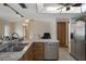 Kitchen with stainless steel appliances, granite countertops, and an open layout at 8283 Shoup St, Spring Hill, FL 34606