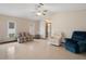 Spacious living room area with tile floors and natural light at 8283 Shoup St, Spring Hill, FL 34606
