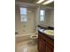 Bathroom featuring shower, sink and toilet at 8291 Weeping Willow St, Brooksville, FL 34613