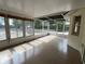 Large screened-in porch features lots of natural light and an outdoor view at 8291 Weeping Willow St, Brooksville, FL 34613